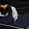 Elegant fashion temperament high-end clothing multi-purpose anti-light fixed clothes pin with zircon feather brooch